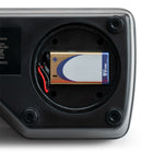 Close-up of the open battery compartment on the Milwaukee MA884 refractometer with a 9V battery installed