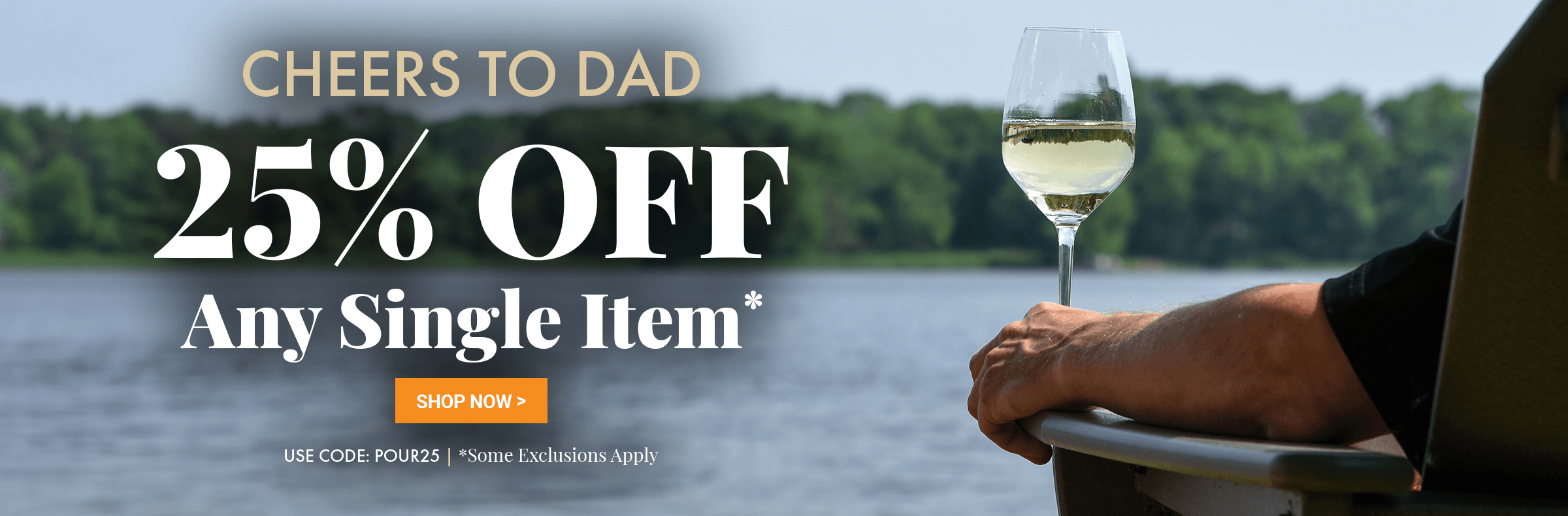 Promotional advertisement with a glass of wine by a lake, offering Cheers to Dad 25% off any single item with code POUR25.