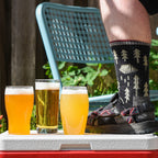 Socks & Sandals Summer Extract Beer Variety Pack with Patrick's Foot wearing socks and sandals on a cooler