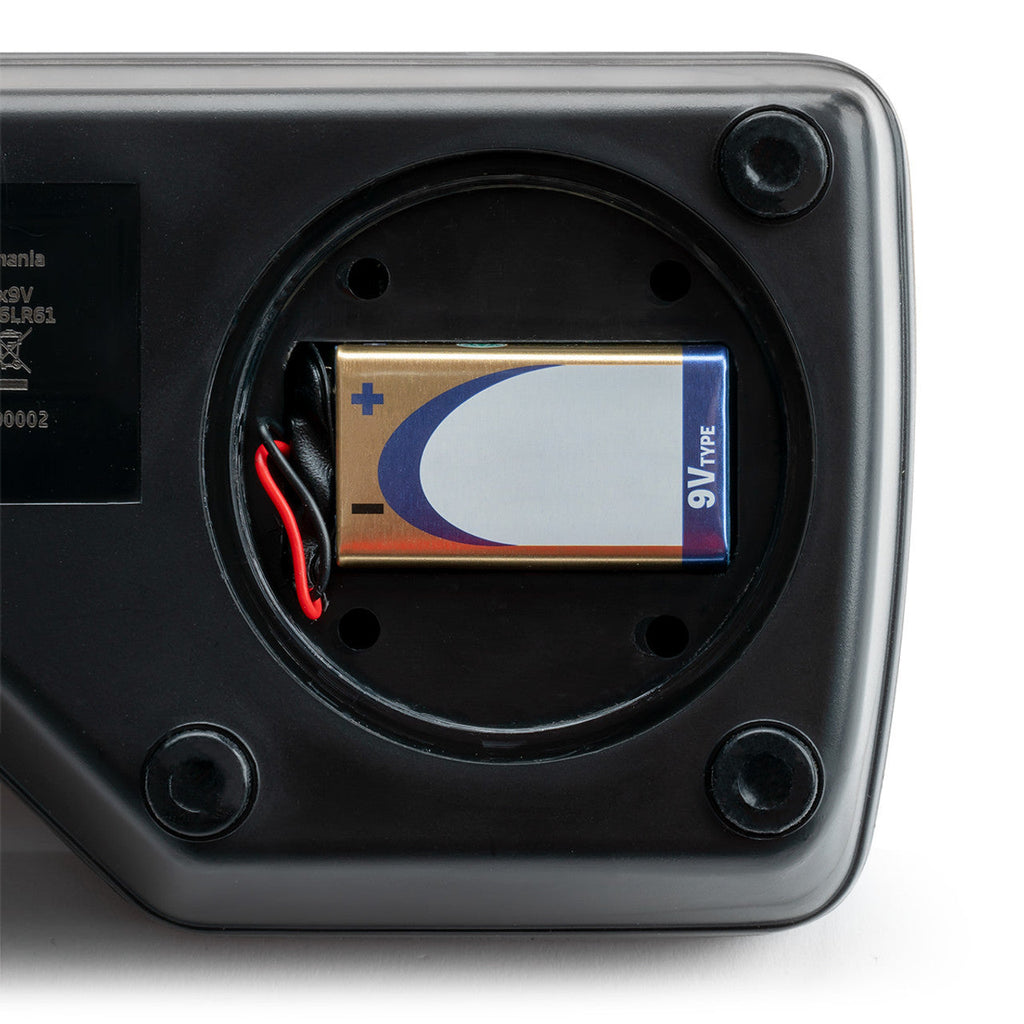 Close-up of the open battery compartment on the Milwaukee MA884 refractometer with a 9V battery installed