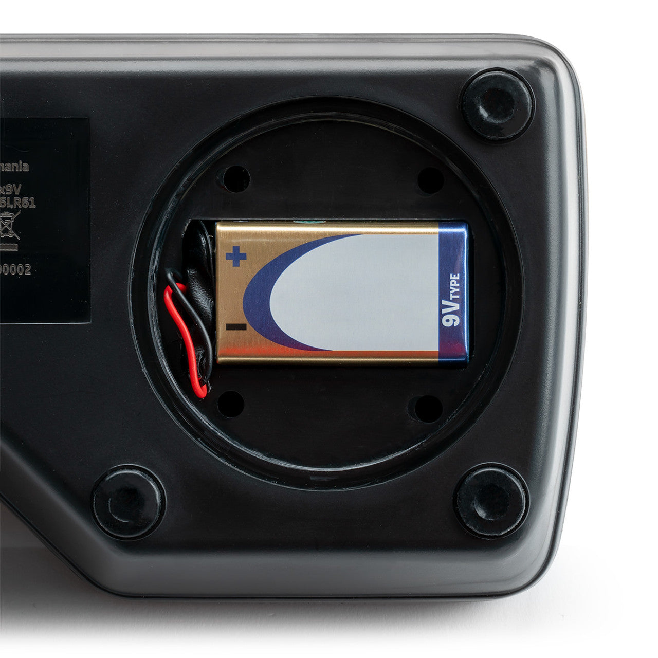 Close-up of the open battery compartment on the Milwaukee MA884 refractometer with a 9V battery installed