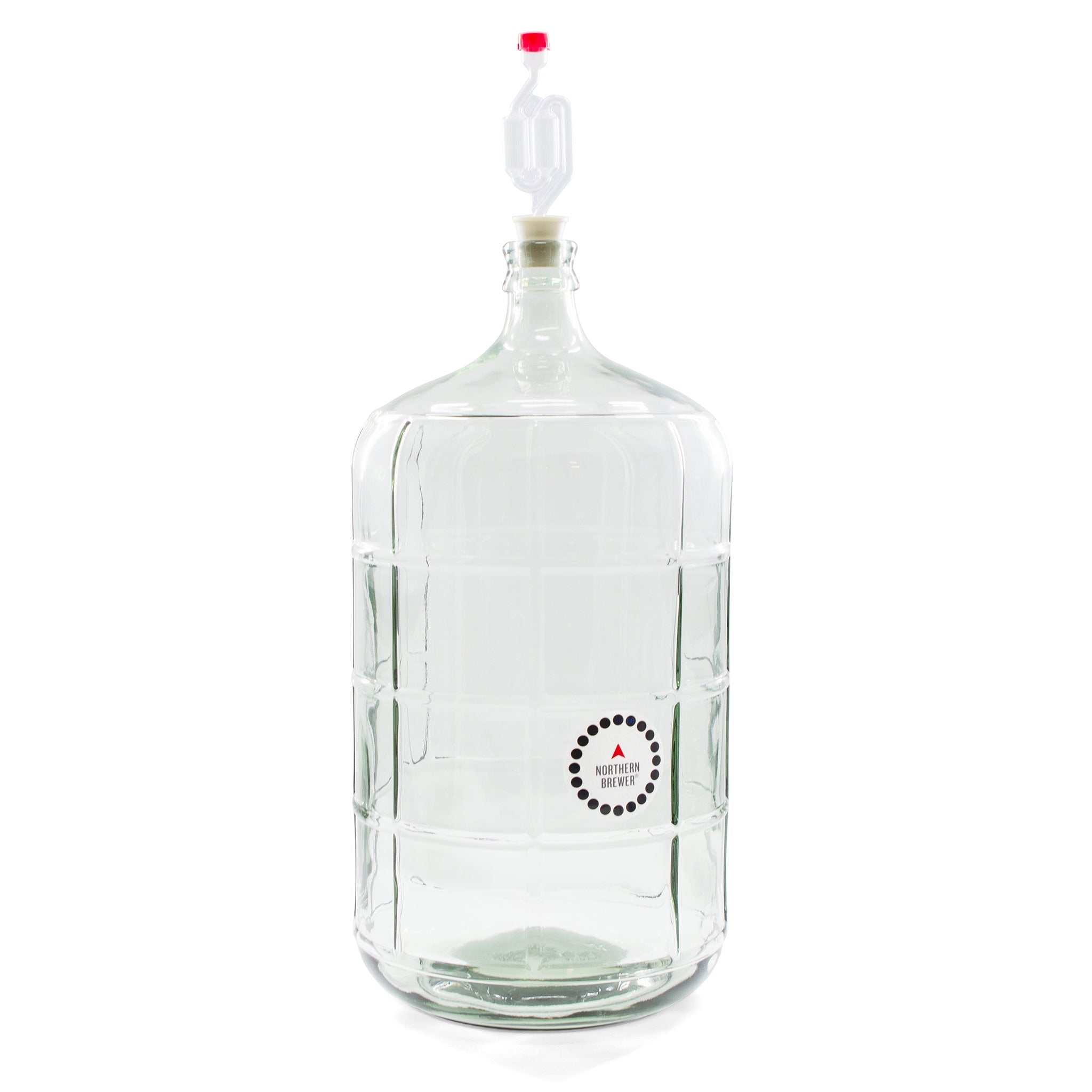 Glass carboy with an airlock and Northern Brewer temperature strip attached, used for secondary fermentation in home wine making.
