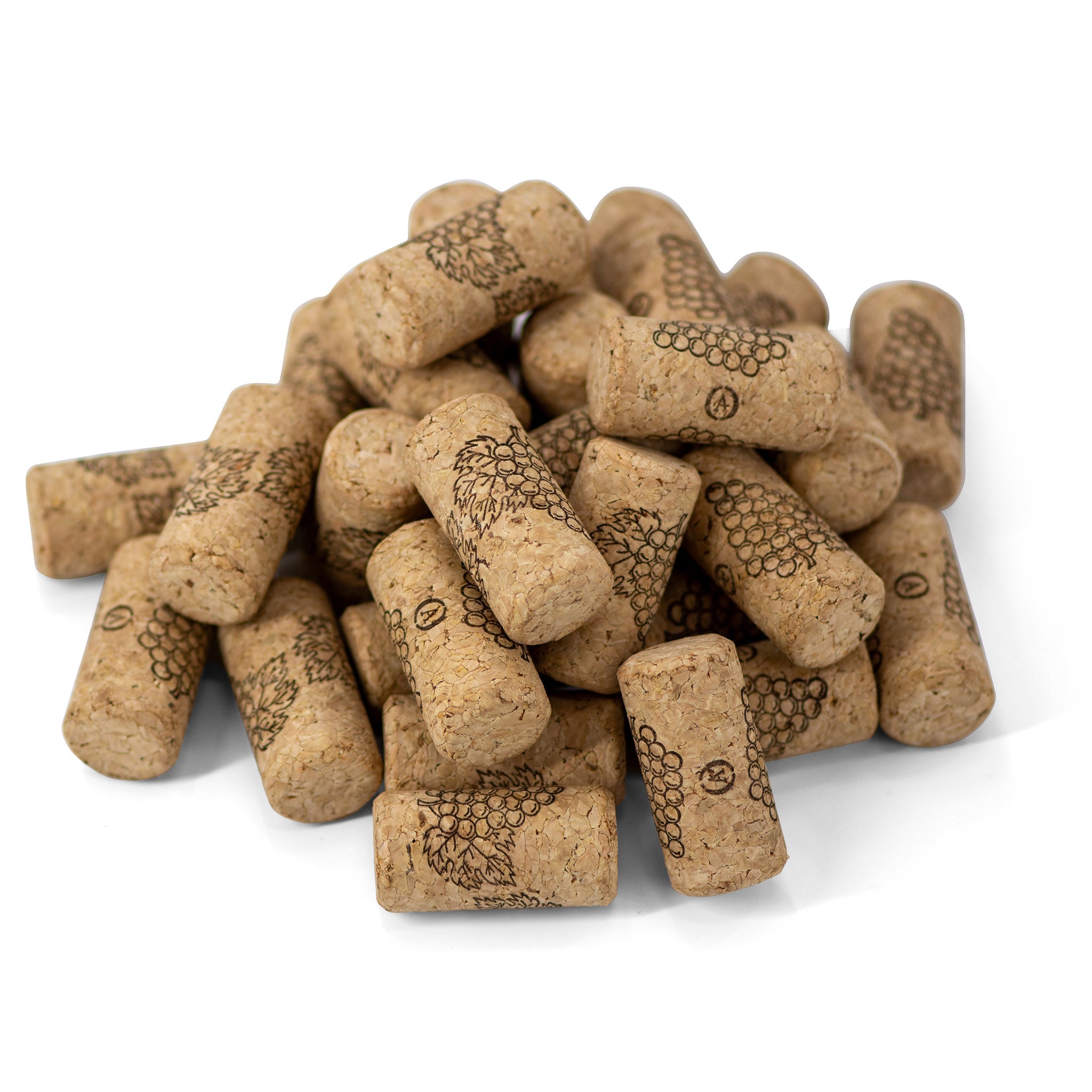 Pile of wine corks with grapevine illustrations, used for sealing bottles in home wine making.