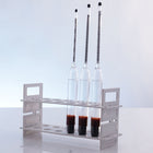 Herculometers resting in a test tube rack