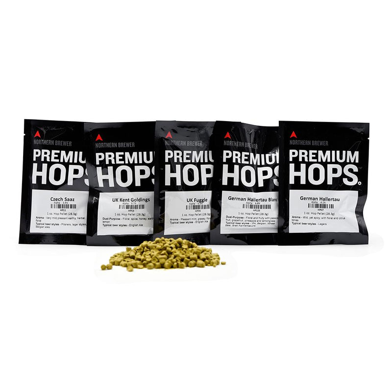All five bags included in the European Noble Type Sampler Pack alongside a small pile of hop pellets