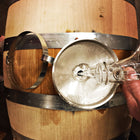 Studio Distilling barrel being filled