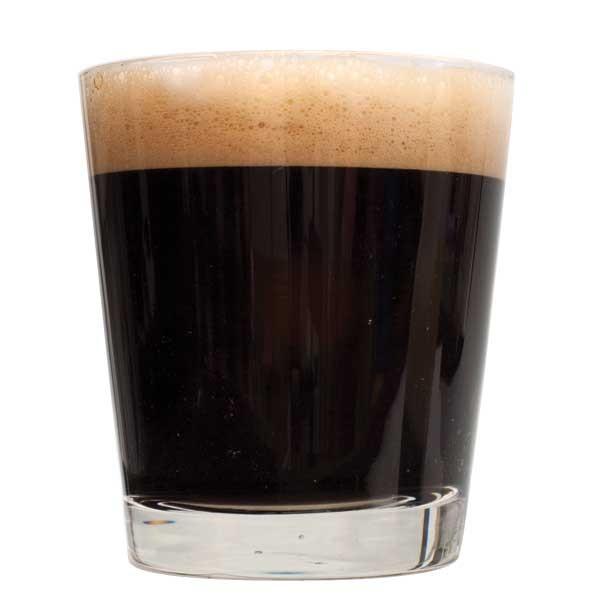 Drinking glass filled with Koa Coconut Porter