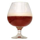 Barley wine homebrew in a glass