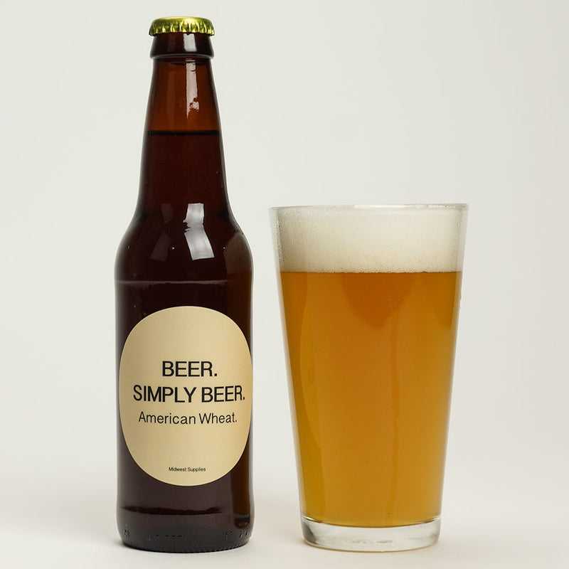 5-Gallon American Wheat Homebrew in a glass beside its bottle