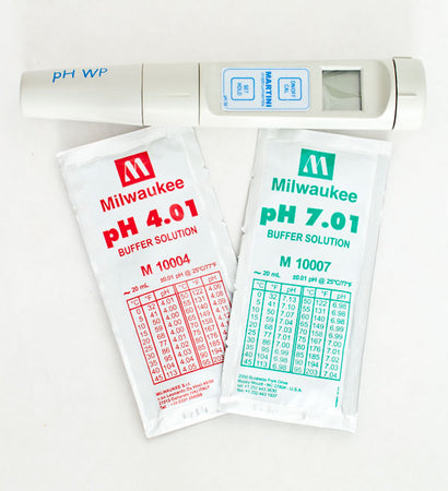 Milwaukee pH56 pH/Temperature Meter alongside 4.01 and 7.01 buffer solution sachets