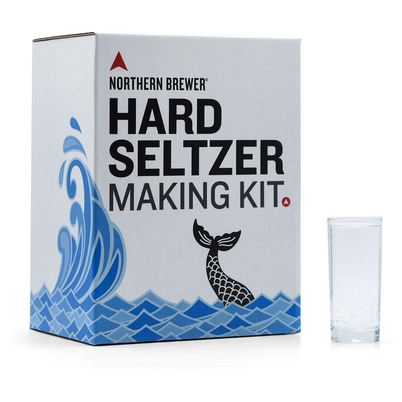 The Hard Seltzer Making Kit box with an empty pint glass