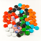 A pile of all types of bottlecaps: gold, red, orange, yellow, green, aqua blue, white, black and U.S. Flag.