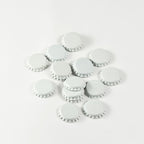White Bottle Caps in a pile