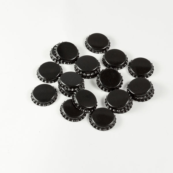 Black Bottle Caps in a pile