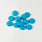 Blue Bottle Caps in a pile