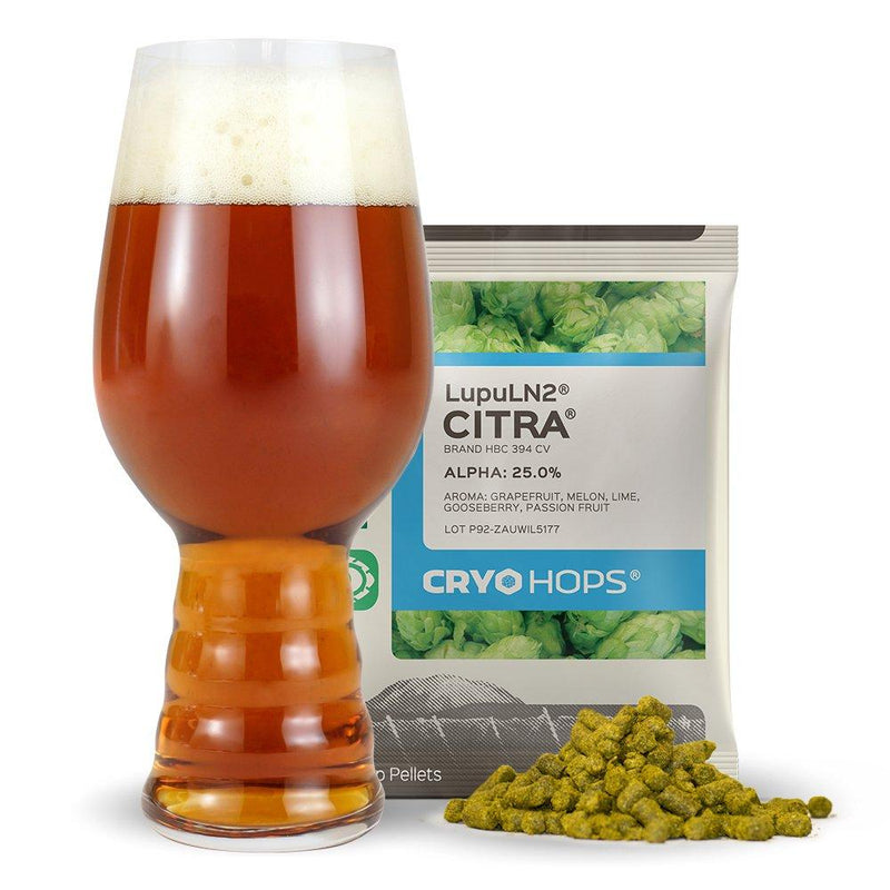Zombie Frost homebrew in a glass in front of a bag and pile of citra cryo hops